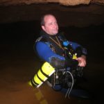 Brian Williams diving at the Logsdon River Sump.