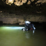 Matt Vinzant prepares to enter Sump 1.