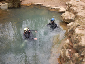 Divers Mark Wenner and Marbry Hardin enter Echo Spring. Photos by Rick Toomey or Rick Olson.